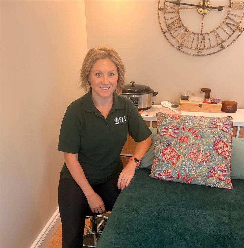 Caroline Hoy, holistic and sports massage therapist, in her treatment room